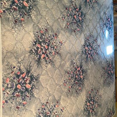 Sunny yellow comforter and white wicker headboard with mattress