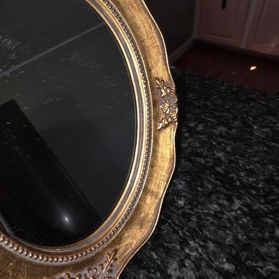 Gold framed mirror