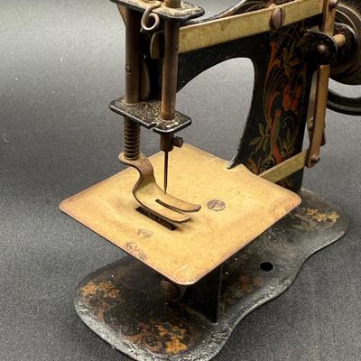 LOT 68H: Vintage Miniature Sewing Machine, + Toy Gun & Telephone