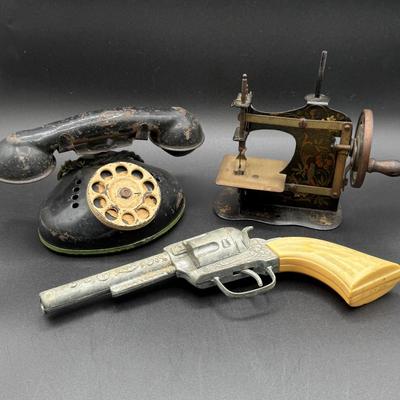 LOT 68H: Vintage Miniature Sewing Machine, + Toy Gun & Telephone
