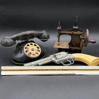LOT 68H: Vintage Miniature Sewing Machine, + Toy Gun & Telephone