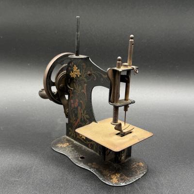 LOT 68H: Vintage Miniature Sewing Machine, + Toy Gun & Telephone