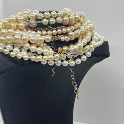 LOT 101J: Faux Pearl Necklace and Bracelet Collection Including Large Enamel Flower Pendant