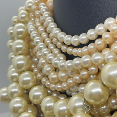 LOT 101J: Faux Pearl Necklace and Bracelet Collection Including Large Enamel Flower Pendant