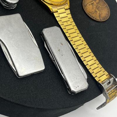 LOT: 106J: Junk Drawer Lot: Lorus Men's Watch (Not Working), Pocket Knives, Vintage Colibri Lighter and 1914 British Penny