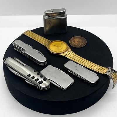 LOT: 106J: Junk Drawer Lot: Lorus Men's Watch (Not Working), Pocket Knives, Vintage Colibri Lighter and 1914 British Penny