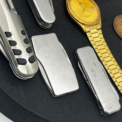 LOT: 106J: Junk Drawer Lot: Lorus Men's Watch (Not Working), Pocket Knives, Vintage Colibri Lighter and 1914 British Penny