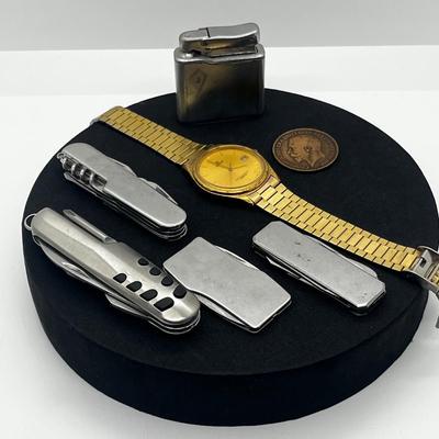 LOT: 106J: Junk Drawer Lot: Lorus Men's Watch (Not Working), Pocket Knives, Vintage Colibri Lighter and 1914 British Penny