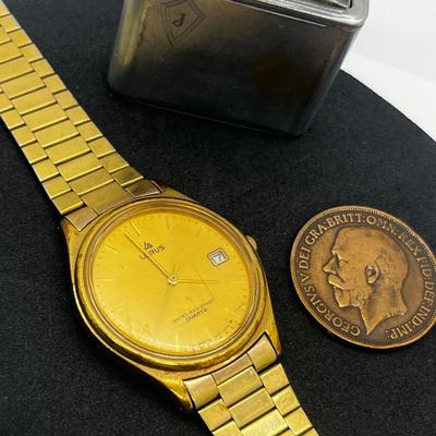 LOT: 106J: Junk Drawer Lot: Lorus Men's Watch (Not Working), Pocket Knives, Vintage Colibri Lighter and 1914 British Penny