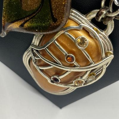 LOT 131J: Large Costume Jewelry Lot: Bracelets, Necklaces, Earrings, Pendants and More! Comes with a Cute Heart Shaped Box!