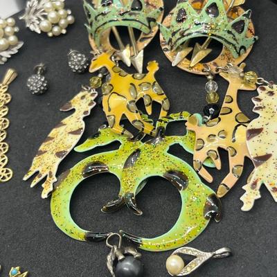 LOT 131J: Large Costume Jewelry Lot: Bracelets, Necklaces, Earrings, Pendants and More! Comes with a Cute Heart Shaped Box!