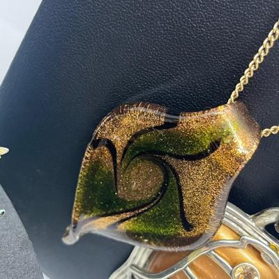 LOT 131J: Large Costume Jewelry Lot: Bracelets, Necklaces, Earrings, Pendants and More! Comes with a Cute Heart Shaped Box!