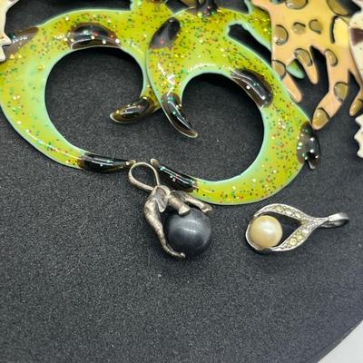 LOT 131J: Large Costume Jewelry Lot: Bracelets, Necklaces, Earrings, Pendants and More! Comes with a Cute Heart Shaped Box!