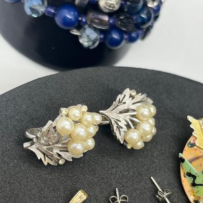 LOT 131J: Large Costume Jewelry Lot: Bracelets, Necklaces, Earrings, Pendants and More! Comes with a Cute Heart Shaped Box!