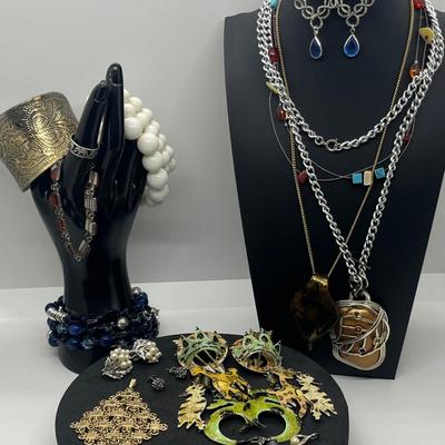 LOT 131J: Large Costume Jewelry Lot: Bracelets, Necklaces, Earrings, Pendants and More! Comes with a Cute Heart Shaped Box!