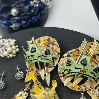 LOT 131J: Large Costume Jewelry Lot: Bracelets, Necklaces, Earrings, Pendants and More! Comes with a Cute Heart Shaped Box!