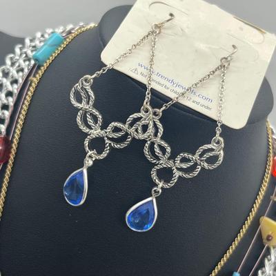 LOT 131J: Large Costume Jewelry Lot: Bracelets, Necklaces, Earrings, Pendants and More! Comes with a Cute Heart Shaped Box!