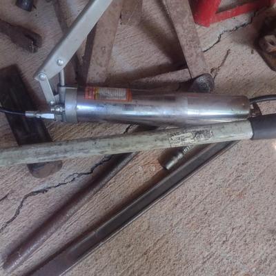 Collection of Automotive Repair Tools Includes Bottle Jack, Maul, Tire Repair and More