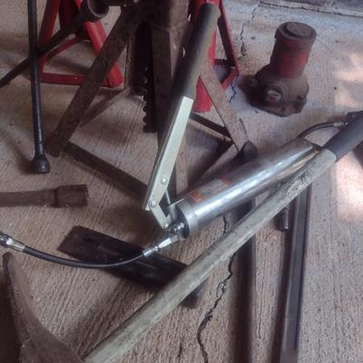 Collection of Automotive Repair Tools Includes Bottle Jack, Maul, Tire Repair and More