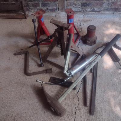 Collection of Automotive Repair Tools Includes Bottle Jack, Maul, Tire Repair and More