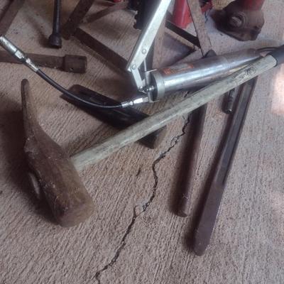Collection of Automotive Repair Tools Includes Bottle Jack, Maul, Tire Repair and More