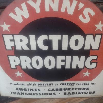 Vintage Wynn's Friction Proofing Advertising Sign and Metal Wire Display Rack