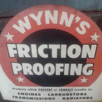 Vintage Wynn's Friction Proofing Advertising Sign and Metal Wire Display Rack