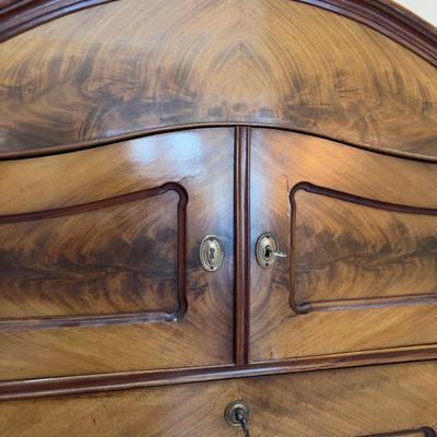 Sale Photo Thumbnail #17: Rare Antique Flame Walnut European Secretary Desk, beautiful condition with the original keys, there is some wear and shrinkage which is to be expected on this early 20th century piece. This item was shipped from Germany by the original owner. Measures 36