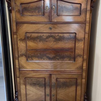 Sale Photo Thumbnail #15: Rare Antique Flame Walnut European Secretary Desk, beautiful condition with the original keys, there is some wear and shrinkage which is to be expected on this early 20th century piece. This item was shipped from Germany by the original owner. Measures 36
