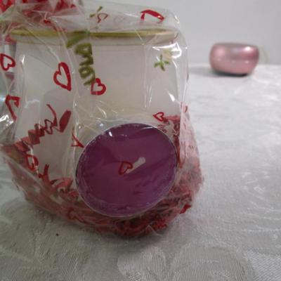 Sale Photo Thumbnail #27: One of the big candles has 3 tealight candles included in the package