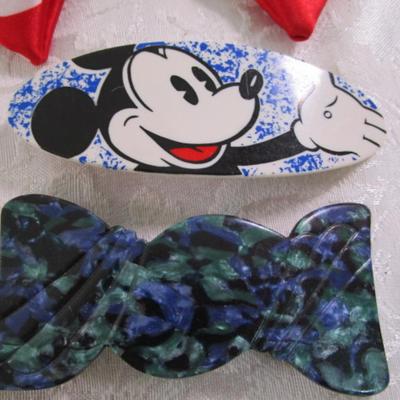 Sale Photo Thumbnail #48: 5 new headbands, 2 Vintage butterfly hair combs, 1 large hair clip, 2 pkg of new snap clips (1 is partial), 1 partial pkg new mini snap clips, 1 new pkg prong hair clips, 1 Minnie Mouse clip, 8 decorative hair clips, Conair hair trimmer