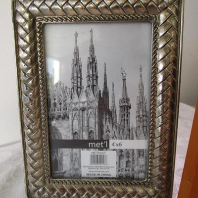 Sale Photo Thumbnail #192: 2 stone  & 1 wood plaques, 1 hinged 2-picture frame, 4 additional picture frames, 1 mirror, see pictures