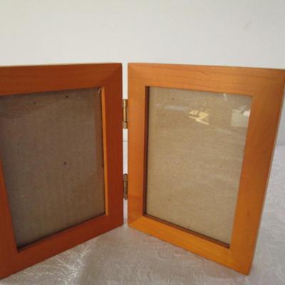 Sale Photo Thumbnail #193: 2 stone  & 1 wood plaques, 1 hinged 2-picture frame, 4 additional picture frames, 1 mirror, see pictures