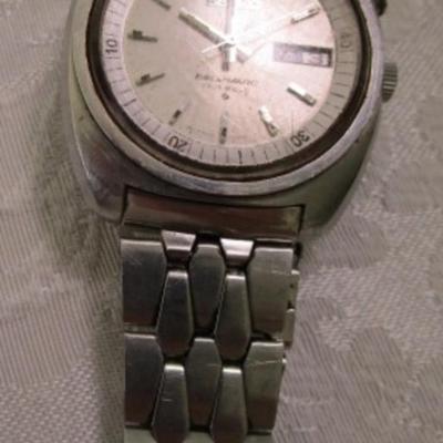 Sale Photo Thumbnail #197: Could use a fresh crystal, sells for $138 on Watch Chart, has original watchband, see pictures