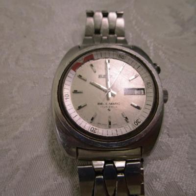 Sale Photo Thumbnail #196: Could use a fresh crystal, sells for $138 on Watch Chart, has original watchband, see pictures