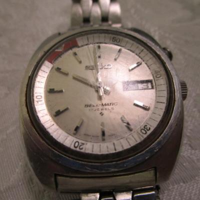 Sale Photo Thumbnail #195: Could use a fresh crystal, sells for $138 on Watch Chart, has original watchband, see pictures