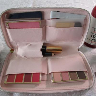 Sale Photo Thumbnail #266: Estee Lauder travel in color palette set with eye shadows, lip color, eye pencil, blush, brush, mirror; makeup bag, exfoliating hand soap, double sided- compact mirror, room spray with essential oils, prong hair clips, see pictures