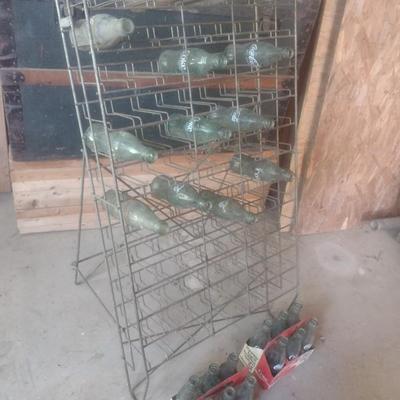 Vintage Wire Frame Soda Bottle Display Rack with Mixed Brand Bottles