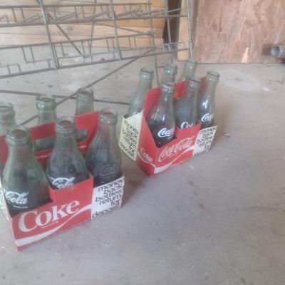 Vintage Wire Frame Soda Bottle Display Rack with Mixed Brand Bottles