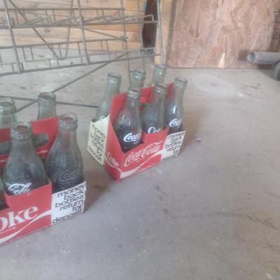 Vintage Wire Frame Soda Bottle Display Rack with Mixed Brand Bottles
