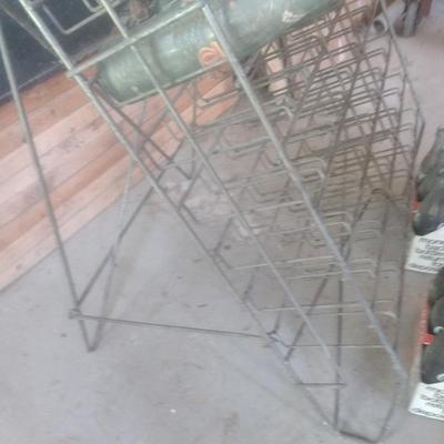 Vintage Wire Frame Soda Bottle Display Rack with Mixed Brand Bottles