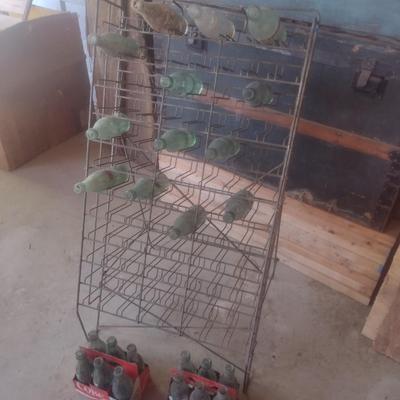 Vintage Wire Frame Soda Bottle Display Rack with Mixed Brand Bottles