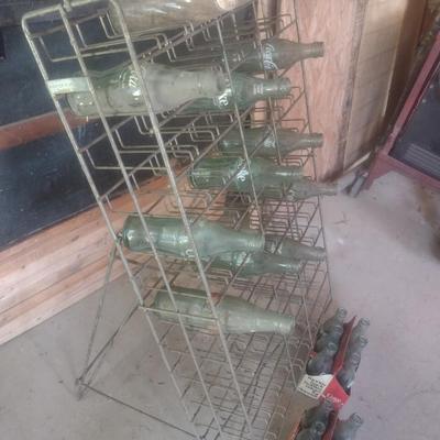 Vintage Wire Frame Soda Bottle Display Rack with Mixed Brand Bottles