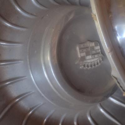 Collection of Vintage Automobile Hubcaps Includes Ford, Cadillac, VW, Others