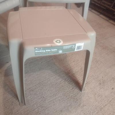 Set of Four Resin Stacking Chairs with One Side Table for Patio or Event