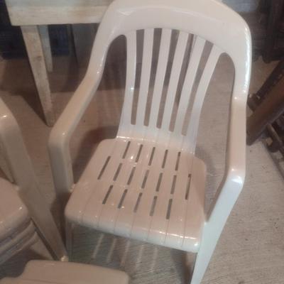 Set of Four Resin Stacking Chairs with One Side Table for Patio or Event