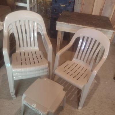 Set of Four Resin Stacking Chairs with One Side Table for Patio or Event