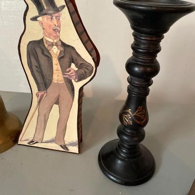 Tall brass bell with misc decor