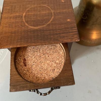 Tall brass bell with misc decor