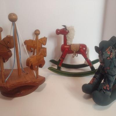 Assortment of Horse Theme Items Includes Wood Rocking Horse, Fabric Rocking Horse, and Wood Horse Carousel